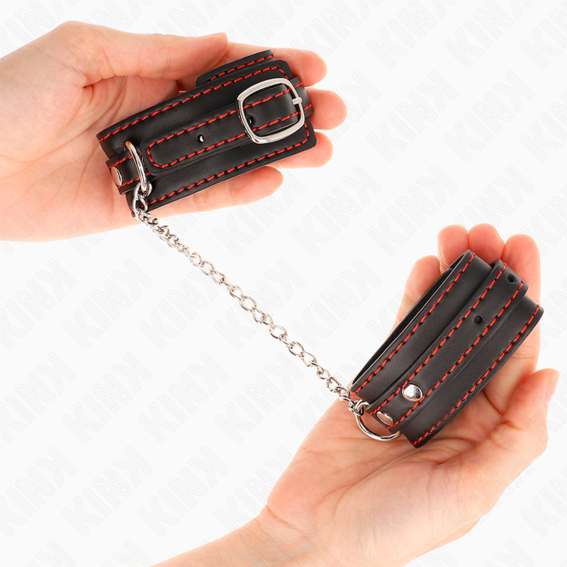 KINK - KLEINE POLSMANCHET ZWART MET RODE VOERING VERSTELBAAR 14-24 CM X 3,5 CM