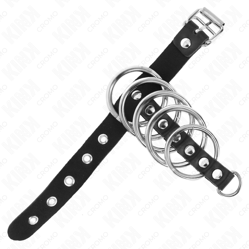 KINK - ANNEAU PÉNIS EN CUIR AVEC SANGLE DE FERMETURE 21 X 2 CM ET 5 ANNEAUX MÉTALLIQUES DE 3 CM À 4 CM